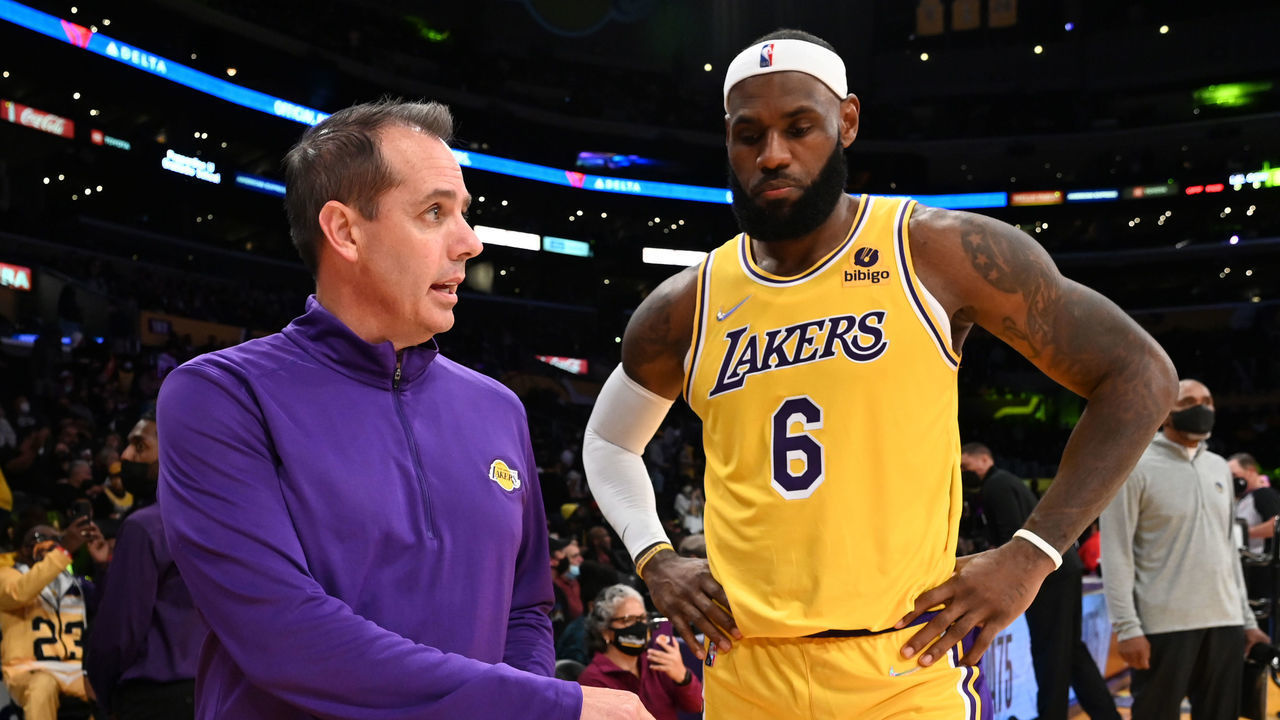 LOS ANGELES, CA - OCTOBER 12: Head Coach Frank Vogel of the Los Angeles Lakers talks to LeBron James #6 during a preseason game against the Golden State Warriorson October 12, 2021 at STAPLES Center in Los Angeles, California. NOTE TO USER: User expressly acknowledges and agrees that, by downloading and/or using this Photograph, user is consenting to the terms and conditions of the Getty Images License Agreement. Mandatory Copyright Notice: Copyright 2021 NBAE