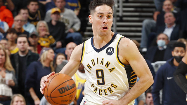 INDIANAPOLIS, IN - NOVEMBER 24: T.J. McConnell #9 of the Indiana Pacers dribbles the ball up court against the Los Angeles Lakers on November 24, 2021 at Gainbridge Fieldhouse in Indianapolis, Indiana. Mandatory Copyright Notice: Copyright 2021 NBAE