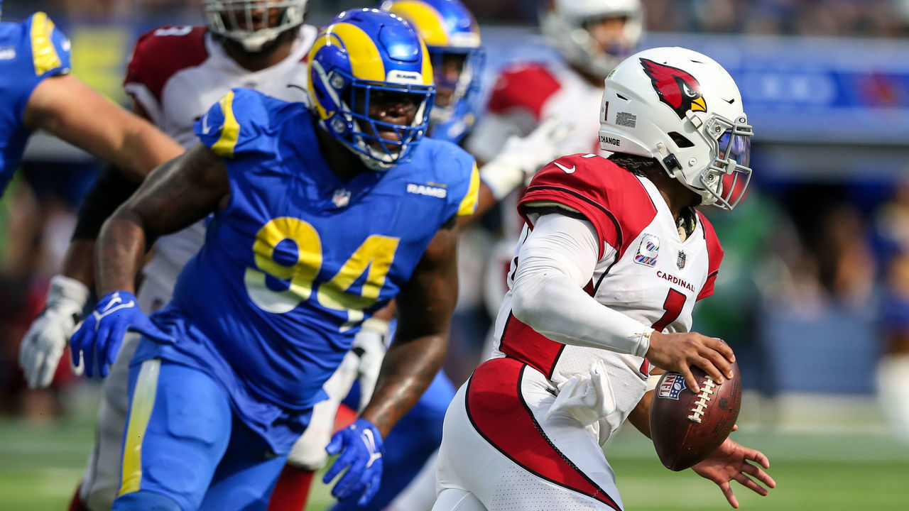 INGLEWOOD, CA - OCTOBER 3: Los Angeles Rams defensive tackle A'Shawn Robinson #94 chases Arizona Cardinals quarterback Kyler Murray #1 during the NFL game between the Arizona Cardinals and the Los Angeles Rams on October 3, 2021, at SoFi Stadium in Inglewood, CA.