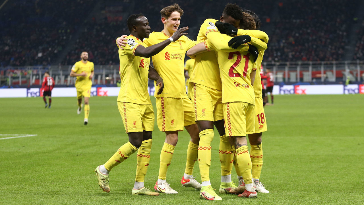 MILAN, ITALY - DECEMBER 07: (BILD OUT) Divock Origi of Liverpool FC celebrates after scoring his team's second goal with teammates during the UEFA Champions League group B match between AC Milan and Liverpool FC at Giuseppe Meazza Stadium on December 7, 2021 in Milan, Italy.