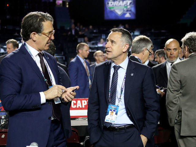 VANCOUVER, BRITISH COLUMBIA - JUNE 22: (L-R) Brendan Shanahan and Laurence Gilman of the Toronto Maple Leafs attend the 2019 NHL Draft at Rogers Arena on June 22, 2019 in Vancouver, Canada.