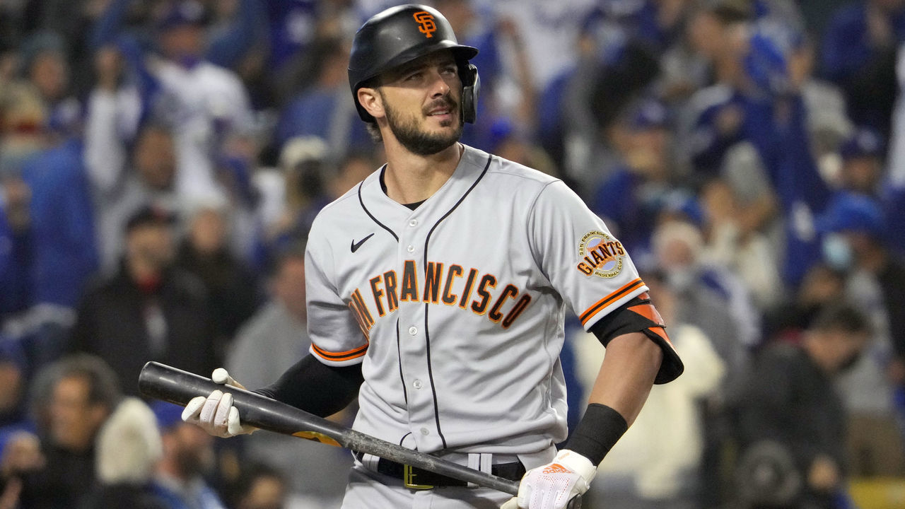 Los Angeles, CA - October 11: Kris Bryant #23 of the San Francisco Giants walks back to the dugout after striking out against the Los Angeles Dodgers during the first inning of the National League Division Series baseball game at Dodger Stadium in Los Angeles on Monday, October 11, 2021.