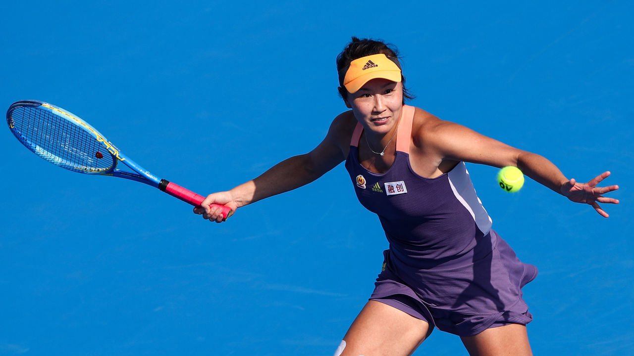 SHENZHEN, CHINA - JANUARY 08: Shuai Peng of China returns a shot during the match against Ekaterina Alexandrova of Russia on Day 4 of 2020 WTA Shenzhen Open at Shenzhen Longgang Sports Center on January 8, 2020 in Shenzhen, China.
