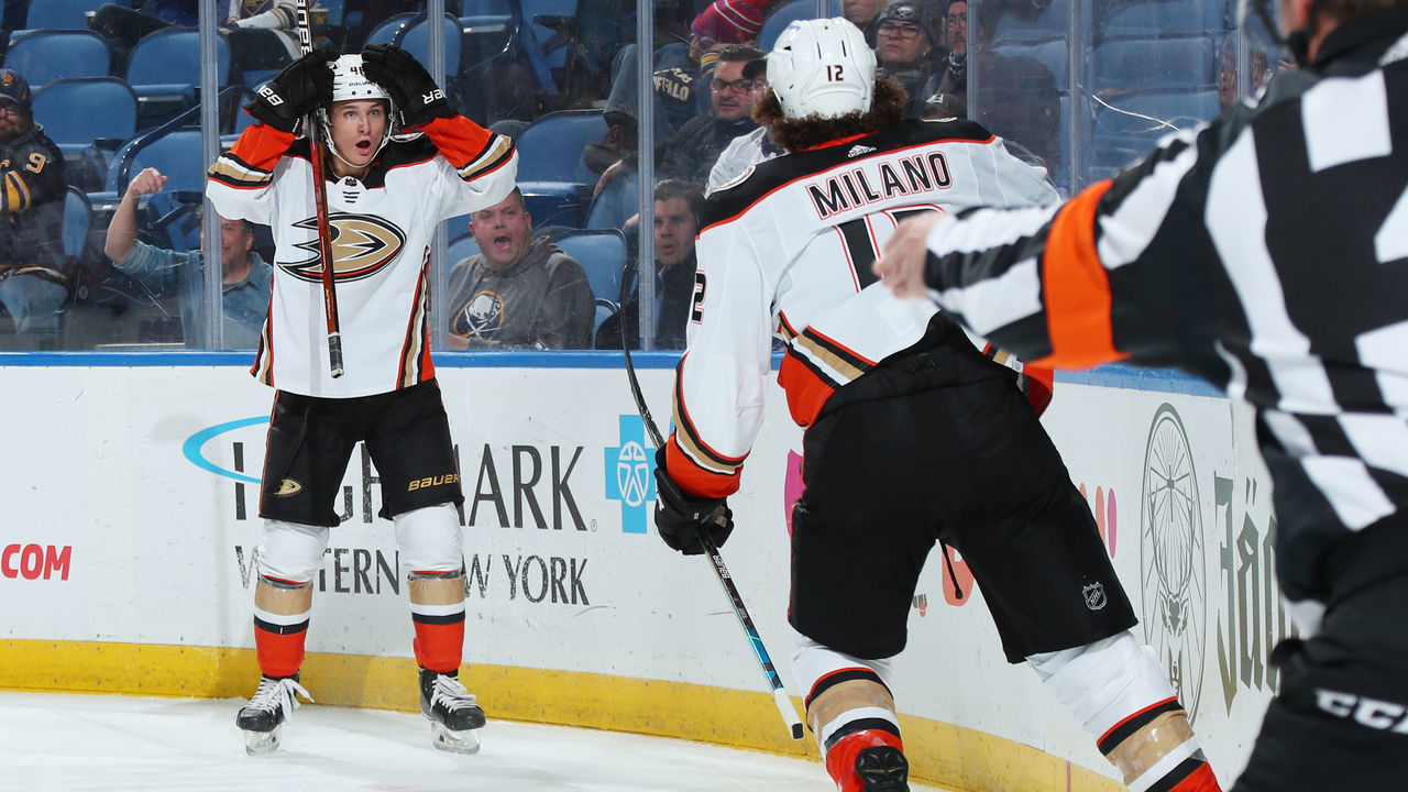 BUFFALO, NY - DECEMBER 7: Trevor Zegras #46 reacts to his behind the net pass assisting on a second period goal by Sonny Milano #12 of the Anaheim Ducks during an NHL game against the Buffalo Sabres on December 7, 2021 at KeyBank Center in Buffalo, New York.