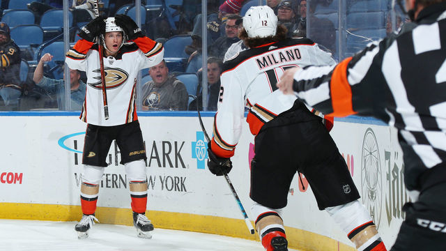 BUFFALO, NY - DECEMBER 7: Trevor Zegras #46 reacts to his behind the net pass assisting on a second period goal by Sonny Milano #12 of the Anaheim Ducks during an NHL game against the Buffalo Sabres on December 7, 2021 at KeyBank Center in Buffalo, New York.