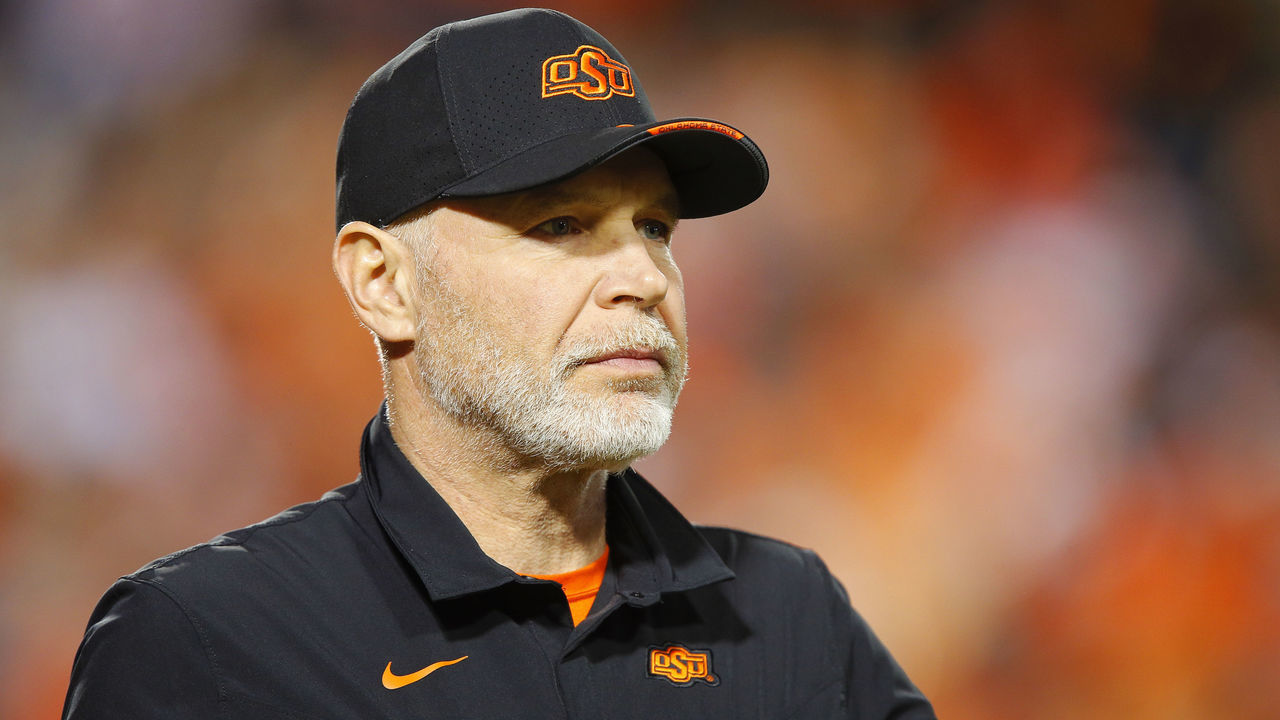 STILLWATER, OK - NOVEMBER 27: Defensive coordinator Jim Knowles of the Oklahoma State Cowboys keeps an eye on his team before a game against the Oklahoma Sooners at Boone Pickens Stadium on November 27, 2021 in Stillwater, Oklahoma. The Cowboys won 'Bedlam' 37-33.
