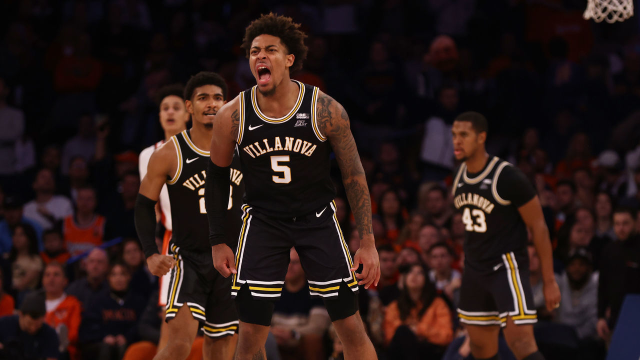 NEW YORK, NEW YORK - DECEMBER 07: Justin Moore #5 of the Villanova Wildcats celebrates against the Syracuse Orange during the 2021 Jimmy V Classic at Madison Square Garden on December 07, 2021 in New York City.