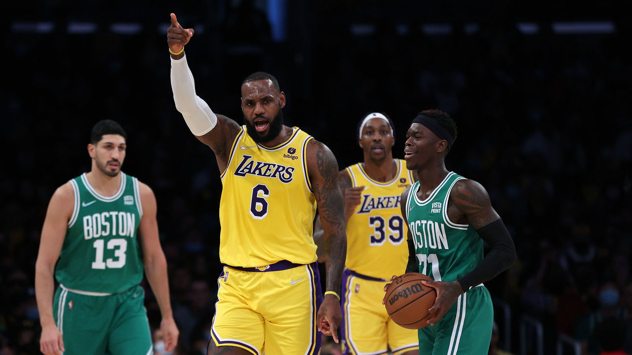 LOS ANGELES, CALIFORNIA - DECEMBER 07: LeBron James #6 of the Los Angeles Lakers reacts to an offensive foul on Dennis Schroder #71 of the Boston Celtics during the first half at Staples Center on December 07, 2021 in Los Angeles, California. NOTE TO USER: User expressly acknowledges and agrees that, by downloading and/or using this Photograph, user is consenting to the terms and conditions of the Getty Images License Agreement. Mandatory Copyright Notice: Copyright 2021 NBAE