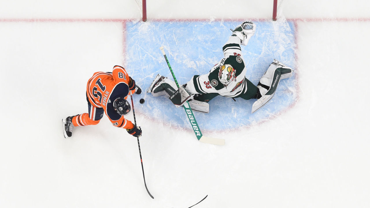 EDMONTON, AB - DECEMBER 7: Cam Talbot #33 of the Minnesota Wild makes a save on a shot from Zach Hyman #18 of the Edmonton Oilers on December 7, 2021 at Rogers Place in Edmonton, Alberta, Canada.
