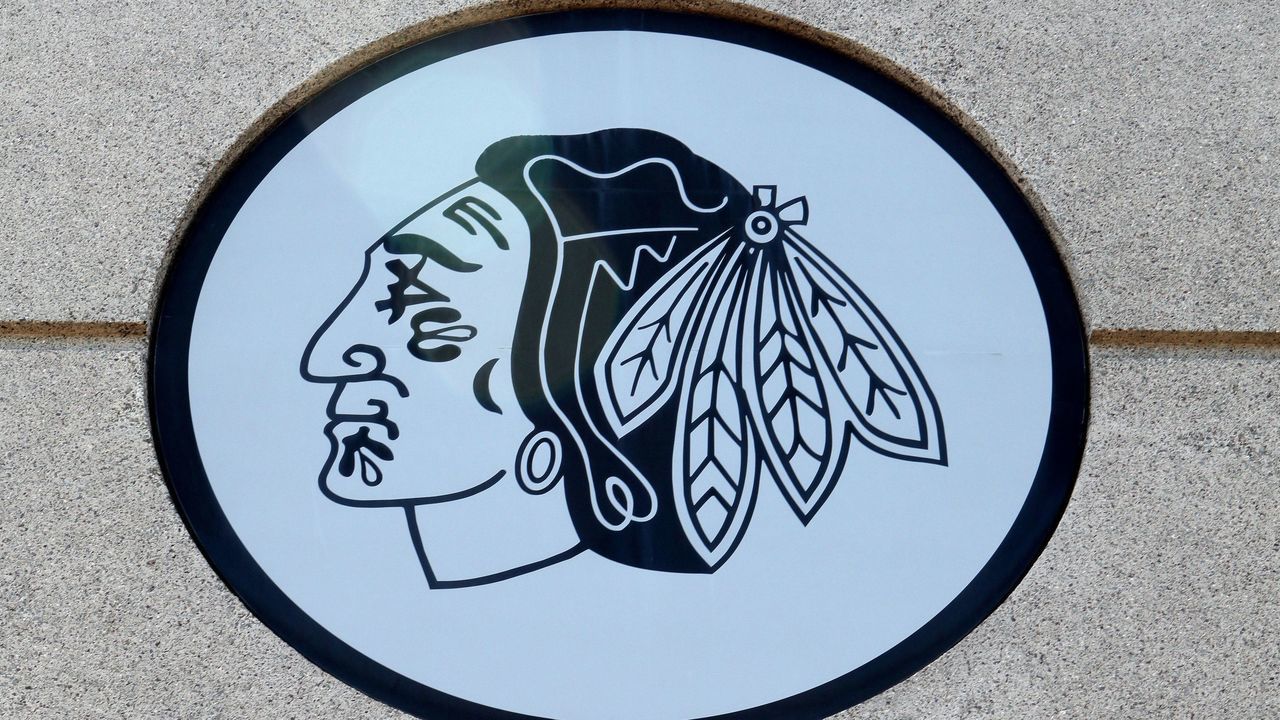 CHICAGO - JUNE 27: Chicago Blackhawks logo, on the side of the United Center, in Chicago, Illinois on JUNE 27, 2013.