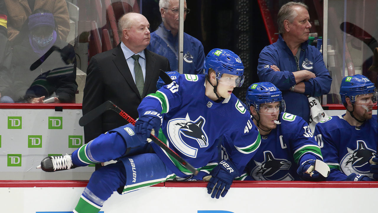 VANCOUVER, BC - DECEMBER 6: Head coach Bruce Boudreau of the Vancouver Canucks looks on from the bench during their NHL game against the Los Angeles Kings at Rogers Arena December 6, 2021 in Vancouver, British Columbia, Canada.