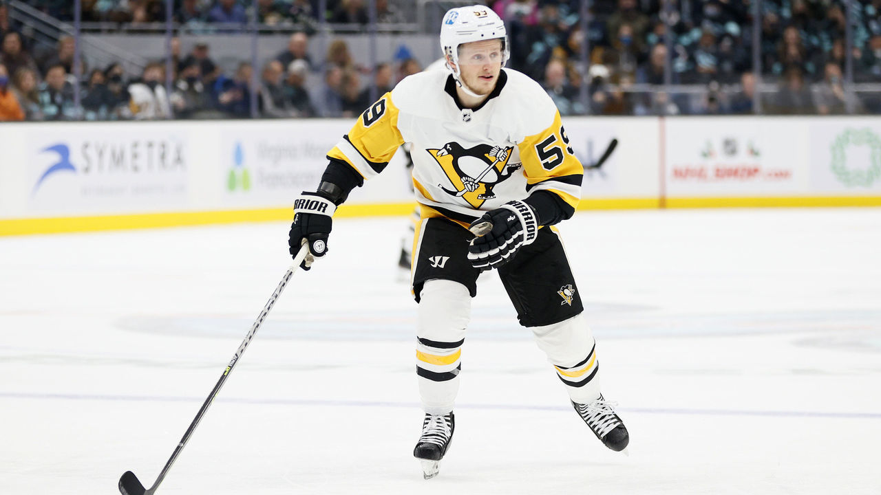 SEATTLE, WASHINGTON - DECEMBER 06: Jake Guentzel #59 of the Pittsburgh Penguins skates against the Seattle Kraken during the first period at Climate Pledge Arena on December 06, 2021 in Seattle, Washington.