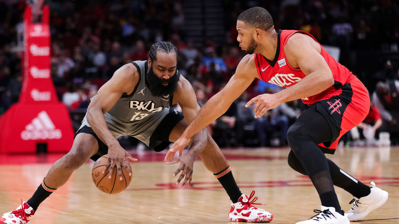 HOUSTON, TEXAS - DECEMBER 08: Eric Gordon #10 of the Houston Rockets defends against James Harden #13 of the Brooklyn Nets during the second half at Toyota Center on December 08, 2021 in Houston, Texas.
