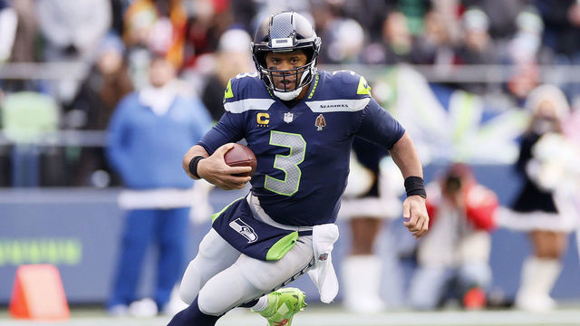 SEATTLE, WASHINGTON - DECEMBER 05: Russell Wilson #3 of the Seattle Seahawks carries the ball against the San Francisco 49ers during the first quarter at Lumen Field on December 05, 2021 in Seattle, Washington.