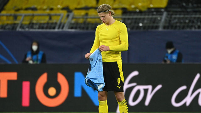 Dortmund's Norwegian forward Erling Braut Haaland after swapping shirts after the UEFA Champions League quarter-final second leg football match between BVB Borussia Dortmund and Manchester City in Dortmund, western Germany, on April 14, 2021.