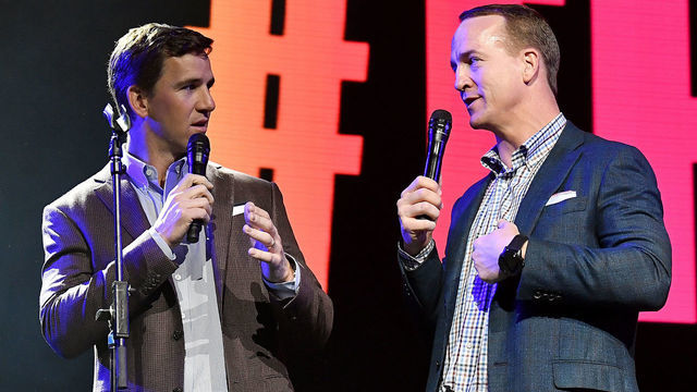 MIAMI, FLORIDA - JANUARY 30: Eli Manning (L) and Peyton Manning speak onstage during the EA Sports Bowl at Bud Light Super Bowl Music Fest on January 30, 2020 in Miami, Florida.
