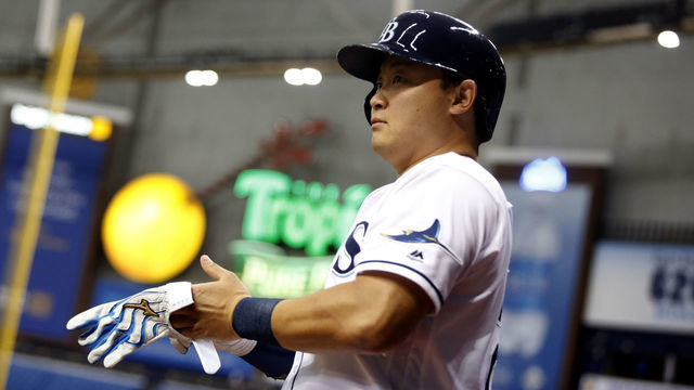 ST. PETERSBURG, FL - JULY 1: Hank Conger #24 of the Tampa Bay Rays dons his batting gloves as he gets on deck to bat during the third inning of a game against the Detroit Tigers on July 1, 2016 at Tropicana Field in St. Petersburg, Florida.
