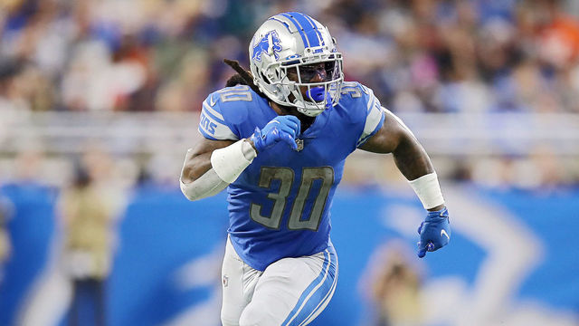 DETROIT, MICHIGAN - NOVEMBER 25: Jamaal Williams #30 of the Detroit Lions runs up the field at Ford Field on November 25, 2021 in Detroit, Michigan.