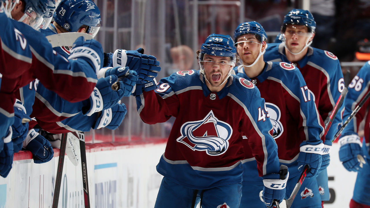DENVER, COLORADO - DECEMBER 10: Samuel Girard #49 of the Colorado Avalanche celebrates a goal against the Detroit Red Wings with his bench at Ball Arena on December 10, 2021 in Denver, Colorado.