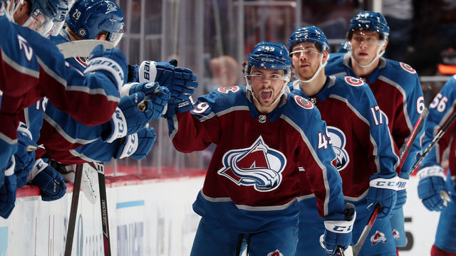 DENVER, COLORADO - DECEMBER 10: Samuel Girard #49 of the Colorado Avalanche celebrates a goal against the Detroit Red Wings with his bench at Ball Arena on December 10, 2021 in Denver, Colorado.