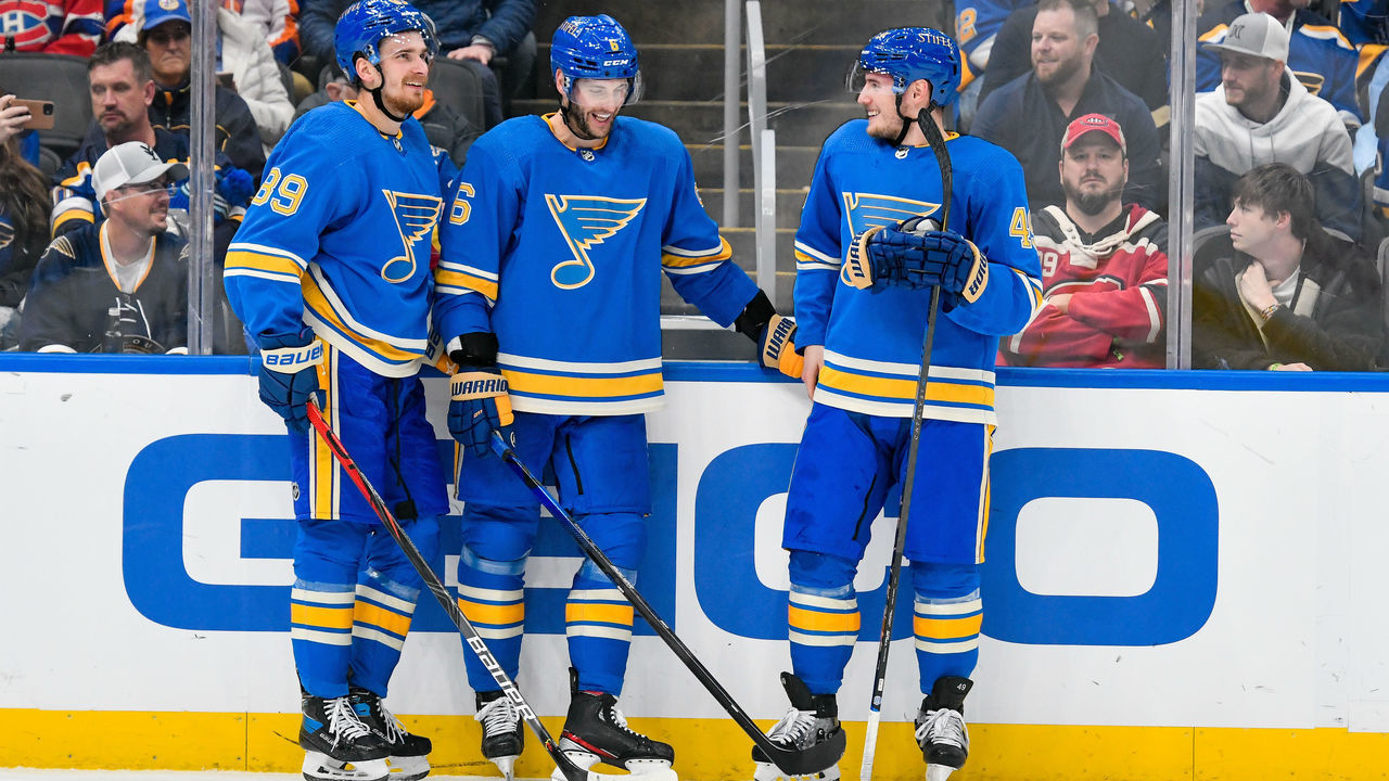 ST. LOUIS, MO - DECEMBER 11: St. Louis Blues left wing Pavel Buchnevich (89), defenseman Marco Scandella (6) and center Ivan Barbashev (49) have a laugh along the boards during a stoppage in play during a game between the Montreal Canadians and the St. Louis Blues on December 11, 2021, at the Enterprise Center in St. Louis MO