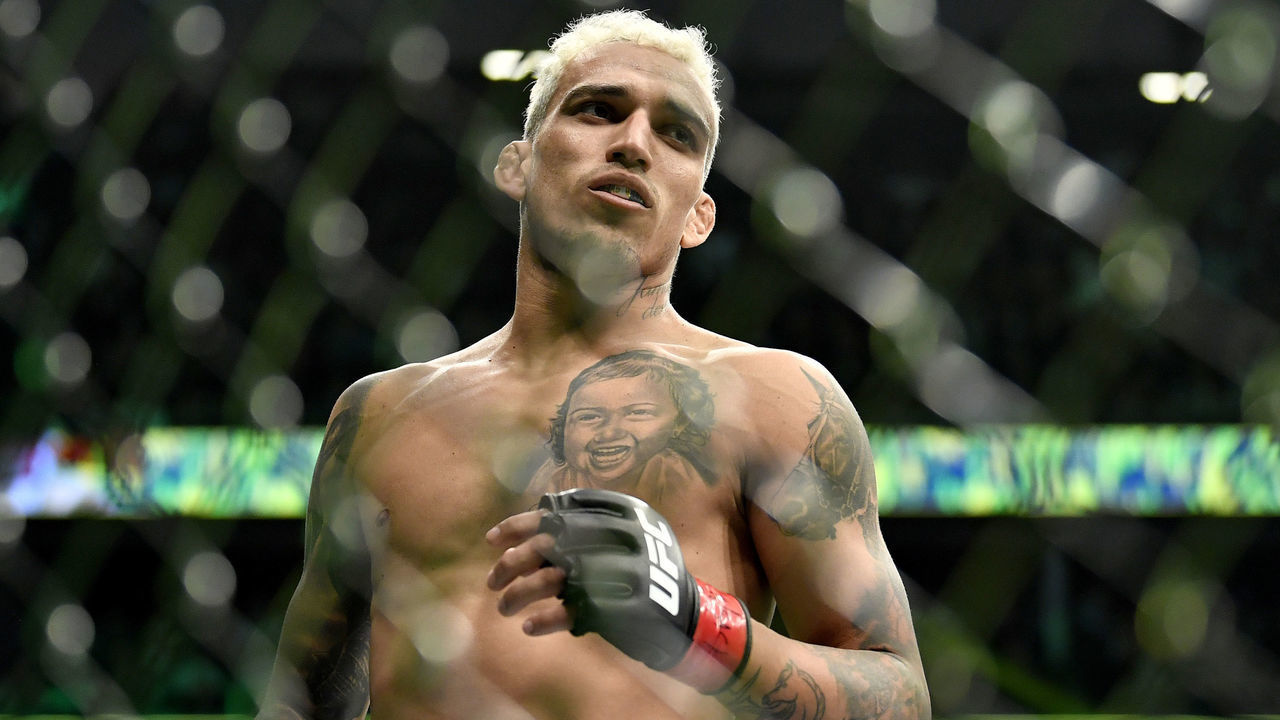 LAS VEGAS, NEVADA - DECEMBER 11: Charles Oliveira of Brazil looks on before his UFC lightweight championship bout against Charles Oliveira of Brazil during the UFC 269 on December 11, 2021 in Las Vegas, Nevada.