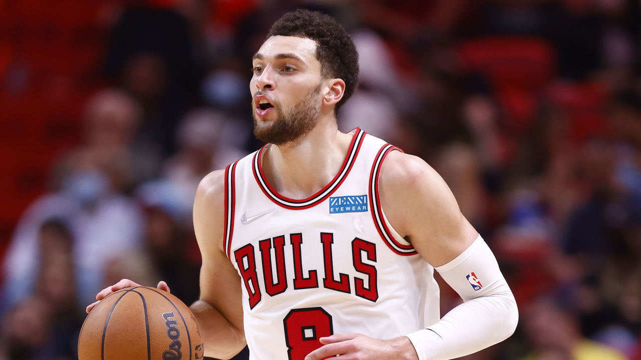 MIAMI, FLORIDA - DECEMBER 11: Zach LaVine #8 of the Chicago Bulls dribbles the ball up the court against the Miami Heat during the second half at FTX Arena on December 11, 2021 in Miami, Florida.