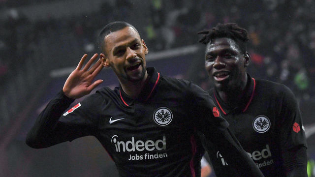 12 December 2021, Hessen, Frankfurt/Main: Soccer: Bundesliga, Eintracht Frankfurt - Bayer 04 Leverkusen, Matchday 15 at Deutsche Bank Park. Frankfurt's goal scorer Djibril Sow (l) and Danny da Costa celebrate after scoring the 5:2l. Photo: Arne Dedert/dpa - IMPORTANT NOTE: In accordance with the regulations of the DFL Deutsche Fußball Liga and/or the DFB Deutscher Fußball-Bund, it is prohibited to use or have used photographs taken in the stadium and/or of the match in the form of sequence pictures and/or video-like photo series.