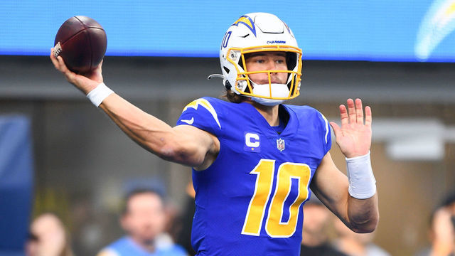 INGLEWOOD, CA - DECEMBER 12: Los Angeles Chargers Quarterback Justin Herbert (10) throws the ball during the NFL game between the New York Giants and the Los Angeles Chargers on December 12, 2021, at SoFi Stadium in Inglewood, CA.
