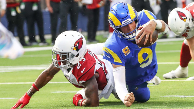 INGLEWOOD, CA - OCTOBER 3: Los Angeles Rams quarterback Matthew Stafford #9 dives for the goalline during the NFL game between the Arizona Cardinals and the Los Angeles Rams on October 3, 2021, at SoFi Stadium in Inglewood, CA.