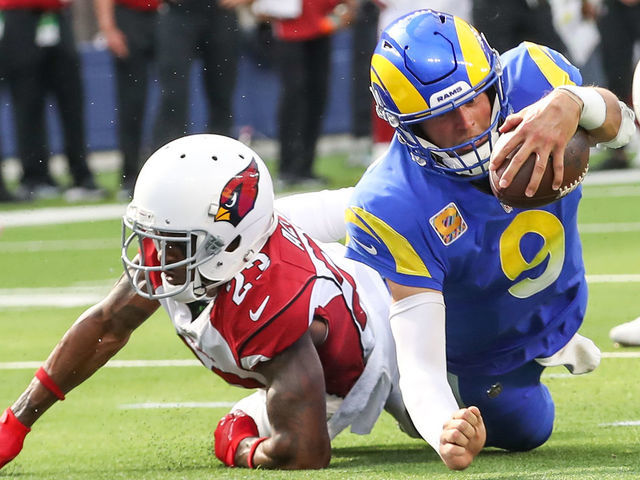 INGLEWOOD, CA - OCTOBER 3: Los Angeles Rams quarterback Matthew Stafford #9 dives for the goalline during the NFL game between the Arizona Cardinals and the Los Angeles Rams on October 3, 2021, at SoFi Stadium in Inglewood, CA.