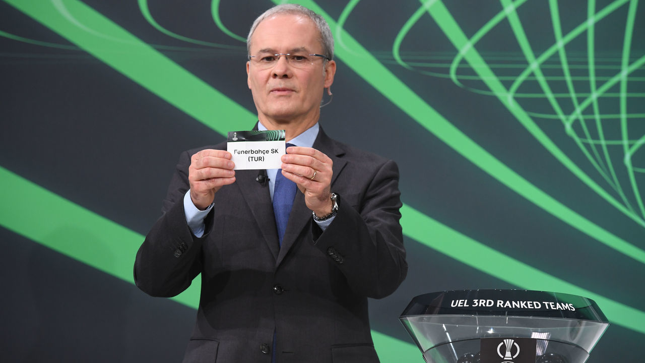 NYON, SWITZERLAND - DECEMBER 13: UEFA Deputy General Secretary Giorgio Marchetti draws out the card of Fenerbahçe SK during the UEFA Europa Conference League 2021/22 Knockout Play offs Round Draw at the UEFA headquarters, The House of European Football, on December 13, 2021, in Nyon, Switzerland.