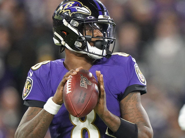 Baltimore Ravens quarterback Lamar Jackson departs with ankle injury