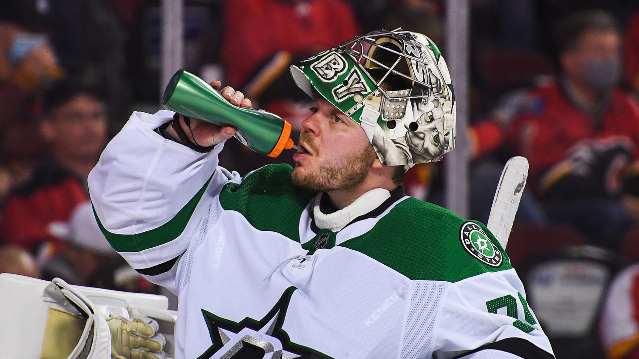 CALGARY, AB - NOVEMBER 4: Anton Khudobin #35 of the Dallas Stars in action against the Calgary Flames during an NHL game at Scotiabank Saddledome on November 4, 2021 in Calgary, Alberta, Canada. The Dallas Stars defeated the Flames 4-3 in overtime.