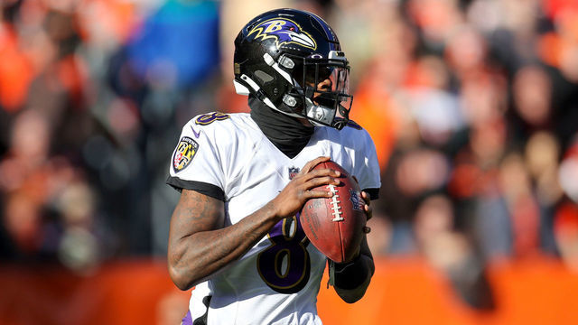 CLEVELAND, OH - DECEMBER 12: Baltimore Ravens quarterback Lamar Jackson (8) looks to pass during the first quarter of the National Football League game between the Baltimore Ravens and Cleveland Browns on December 12, 2021, at FirstEnergy Stadium in Cleveland, OH.