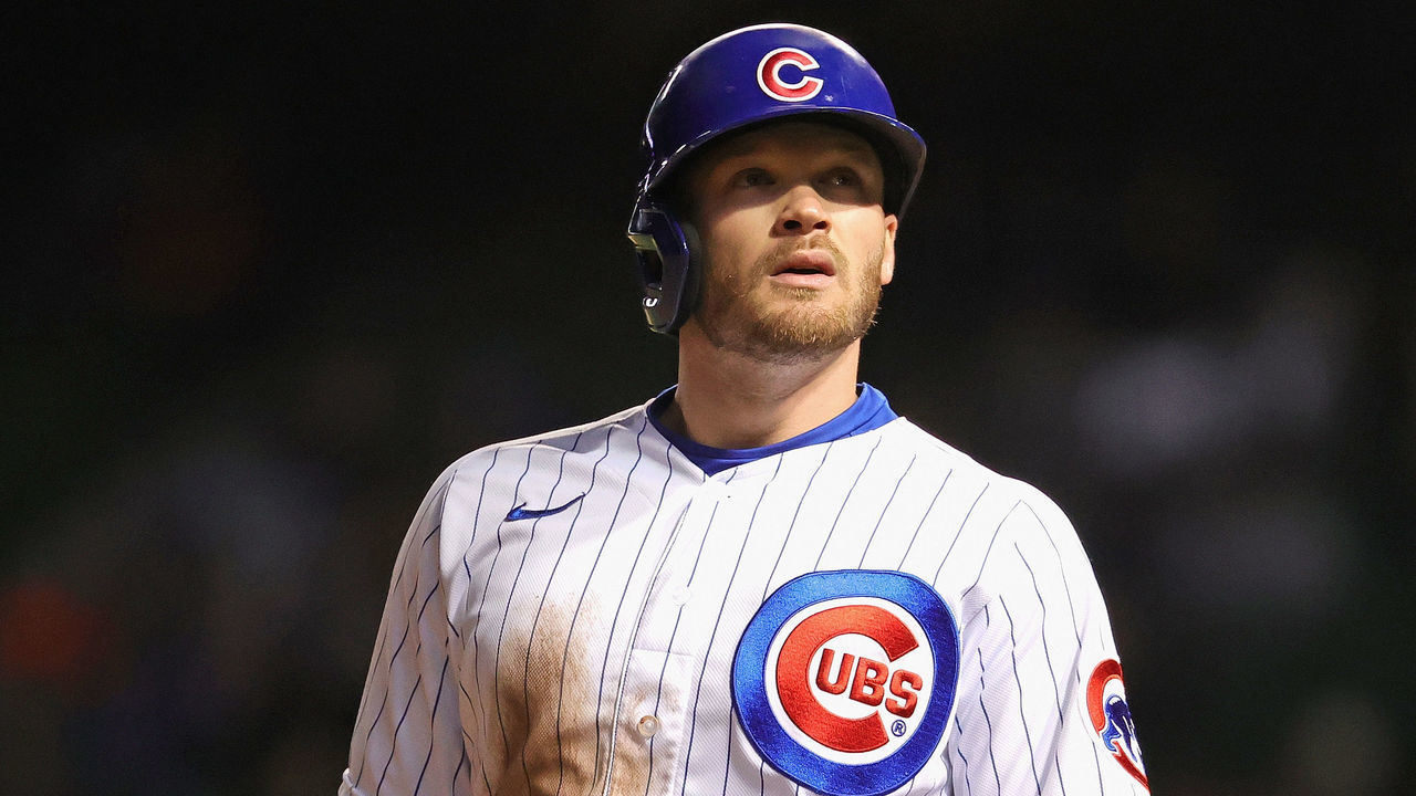 CHICAGO, ILLINOIS - SEPTEMBER 22: Ian Happ #8 of the Chicago Cubs looks into the stands while standing on third base against the Minnesota Twins at Wrigley Field on September 22, 2021 in Chicago, Illinois.