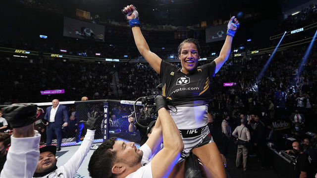 LAS VEGAS, NEVADA - DECEMBER 11: Julianna Pena celebrates her victory over Amanda Nunes of Brazil in their UFC bantamweight championship bout during the UFC 269 on December 11, 2021 in Las Vegas, Nevada.