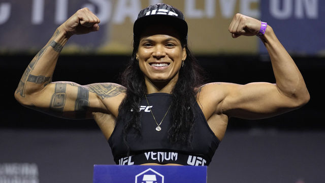LAS VEGAS, NEVADA - DECEMBER 10: Amanda Nunes of Brazil poses on the scale during the UFC 269 ceremonial weigh-in at MGM Grand Garden Arena on December 10, 2021 in Las Vegas, Nevada.