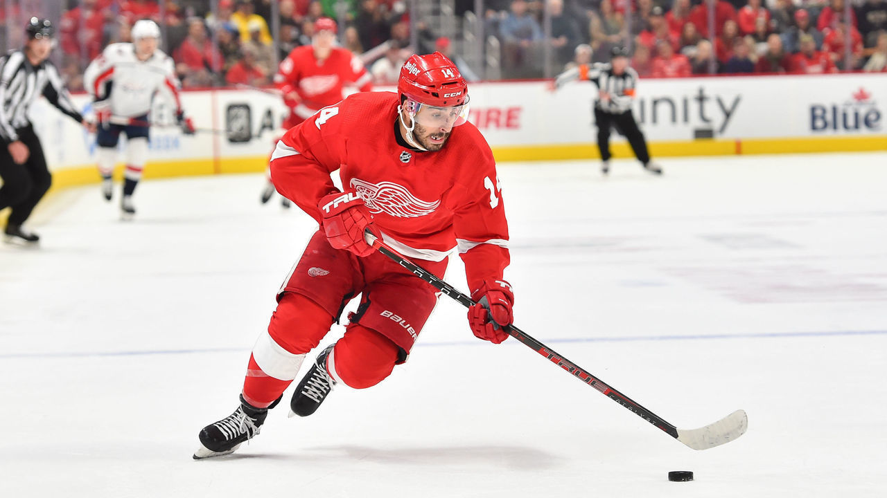 DETROIT, MI - NOVEMBER 11: Detroit Red Wings center Robby Fabbri (14) rushes over the blue line with the puck during the game between the Detroit Red Wings and the Washington Capitals on Thursday November 11, 2021 at Little Caesars Arena Center in Detroit, MI.