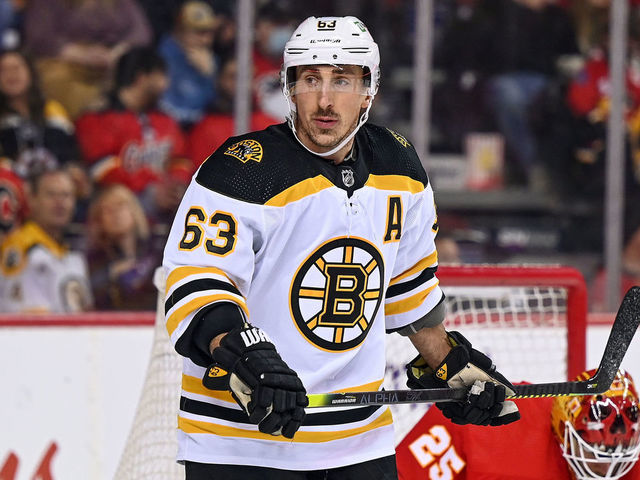 CALGARY, AB - DECEMBER 11: Boston Bruins Left Wing Brad Marchand (63) looks on during the first period of an NHL game where the Calgary Flames hosted the Boston Bruins on December 11, 2021, at the Scotiabank Saddledome in Calgary, AB.