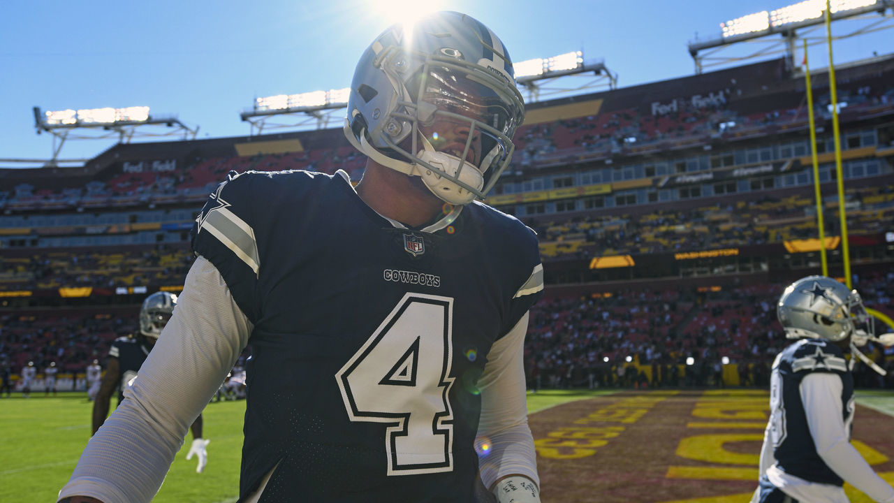 LANDOVER, MD - DECEMBER 12: Dallas Cowboys quarterback Dak Prescott (4) takes the field for the NFL game between the Dallas Cowboys and the Washington Football Team on December 12, 2021 at Fed Ex Field in Landover, MD.