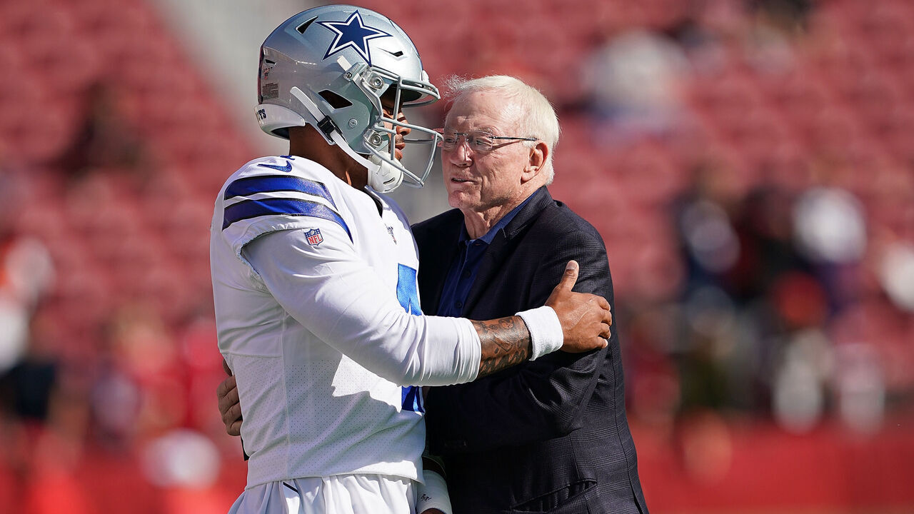 SANTA CLARA, CA - AUGUST 10: Quarterback Dak Prescott #4 and team owner Jerry Jones of the Dallas Cowboys hug each other during pregame warm ups prior to the start of an NFL preseason football game against the San Francisco 49ers at Levi's Stadium on August 10, 2019 in Santa Clara, California.