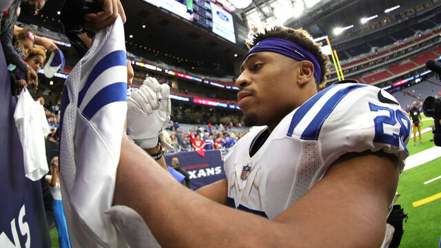 HOUSTON, TEXAS - DECEMBER 05: Jonathan Taylor #28 of the Indianapolis Colts signs autographs after the game \ahou at NRG Stadium on December 05, 2021 in Houston, Texas.