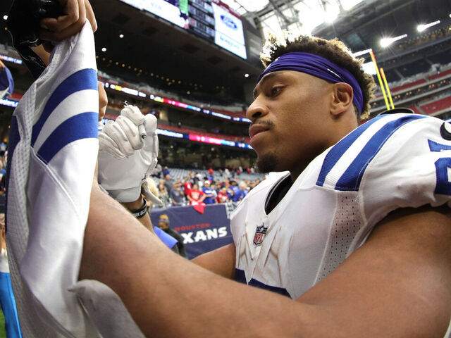 HOUSTON, TEXAS - DECEMBER 05: Jonathan Taylor #28 of the Indianapolis Colts signs autographs after the game \ahou at NRG Stadium on December 05, 2021 in Houston, Texas.