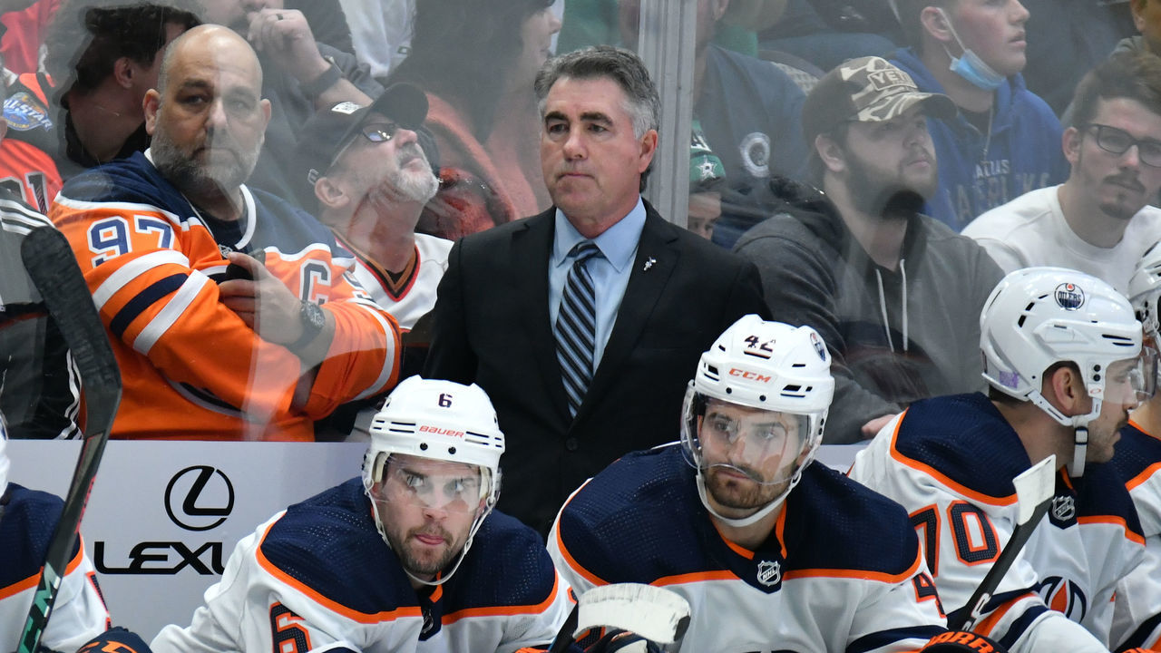 DALLAS, TX - NOVEMBER 23: Dave Tippett of the Edmonton Oilers watches the action from behind the bench against the Dallas Stars at the American Airlines Center on November 23, 2021 in Dallas, Texas.