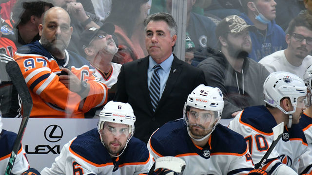DALLAS, TX - NOVEMBER 23: Dave Tippett of the Edmonton Oilers watches the action from behind the bench against the Dallas Stars at the American Airlines Center on November 23, 2021 in Dallas, Texas.