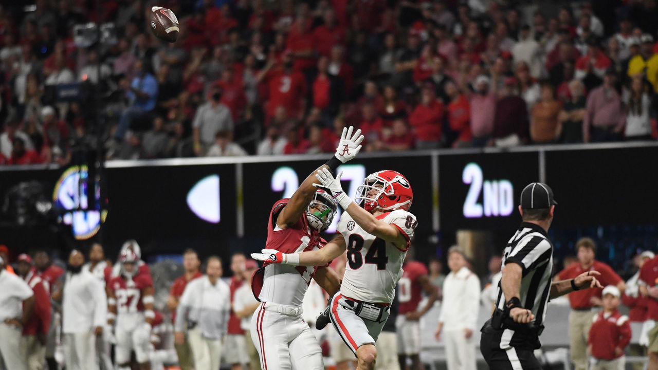 ATLANTA, GA - DECEMBER 04: Alabama Crimson Tide Defensive Back Kool-Aid McKinstry (1) defends Georgia Bulldogs Wide Receiver Ladd McConkey (84) during the SEC Championship game between the Alabama Crimson Tide and the Georgia Bulldogs on December 04, 2021, at Mercedes-Benz Stadium in Atlanta, Ga.