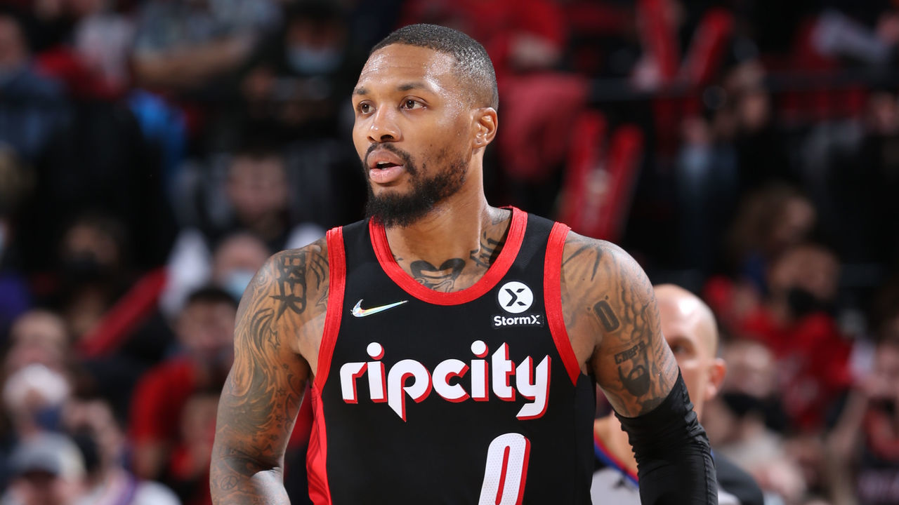 PORTLAND, OR - DECEMBER 14: Damian Lillard #0 of the Portland Trail Blazers dribbles the ball during the game against the Phoenix Suns on December 14, 2021 at the Moda Center Arena in Portland, Oregon. Mandatory Copyright Notice: Copyright 2021 NBAE