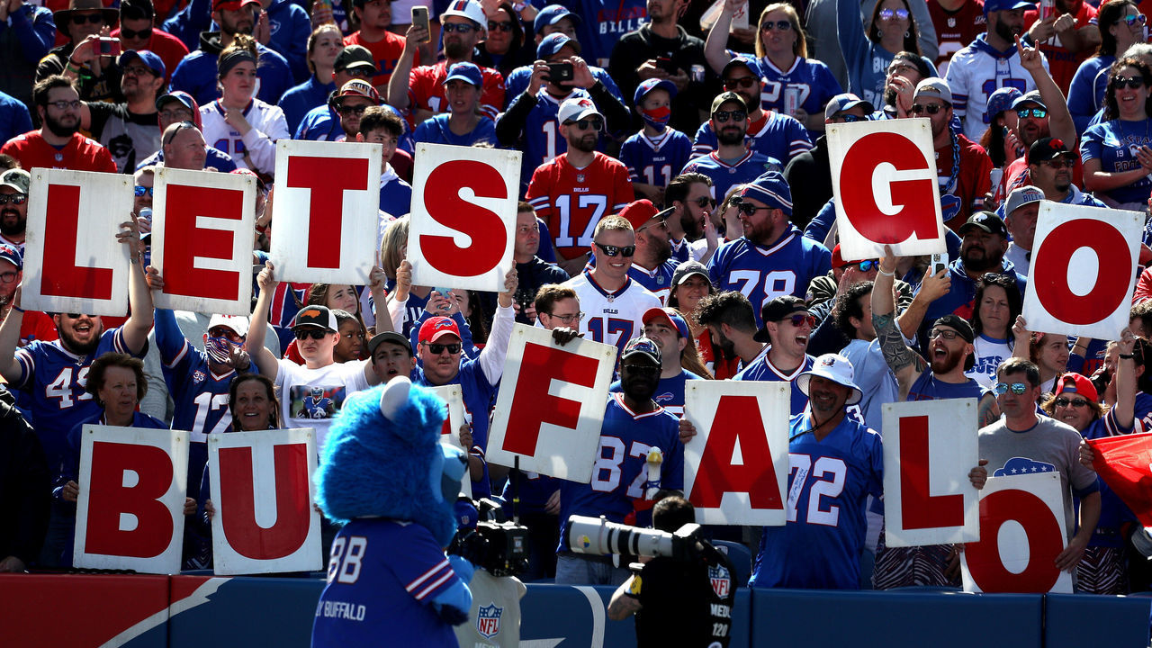 ORCHARD PARK, NEW YORK - SEPTEMBER 26: Fans hold signs prior to a game between the Buffalo Bills and the Washington Football Team at Highmark Stadium on September 26, 2021 in Orchard Park, New York.