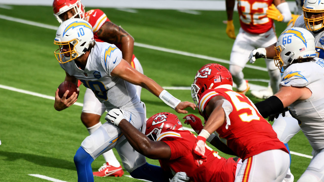 INGLEWOOD, CA - SEPTEMBER 20: Quarterback Justin Herbert #10 of the Los Angeles Chargers scrambles against the Kansas City Chiefs in the second half of a NFL football game at SoFi Stadium in Inglewood on Sunday, September 20, 2020. Kansas City Chiefs won 23-20 in overtime.